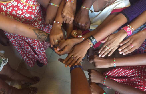 Group shot of the girls wrists and their bracelets