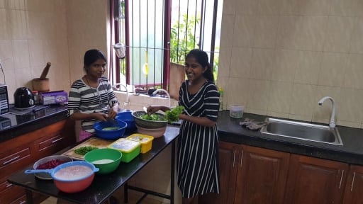 Girls in the kitchen learning to cook