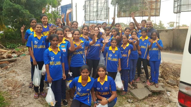 Group photo in cricket uniforms